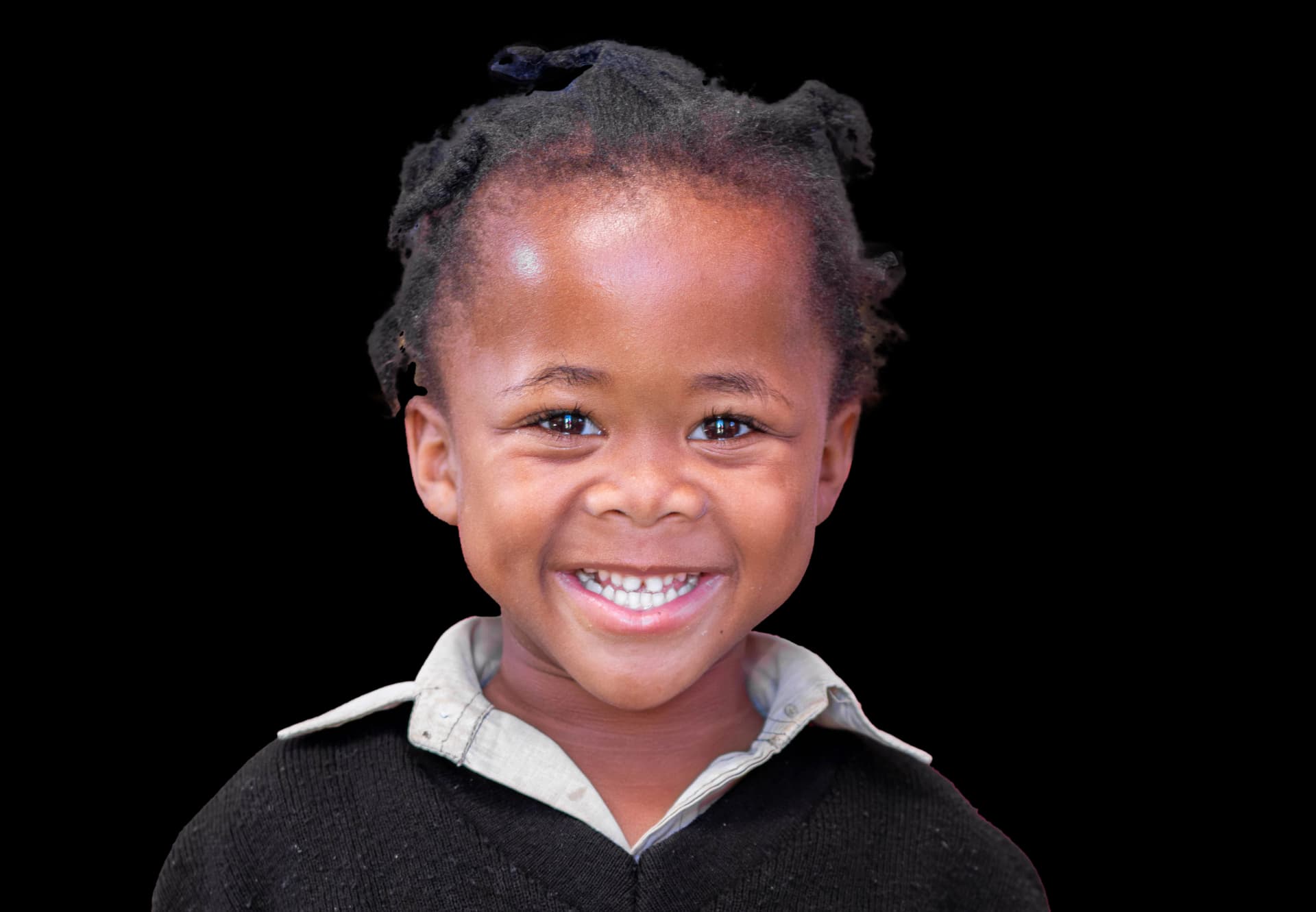 Smiling child from Early Childhood Education program